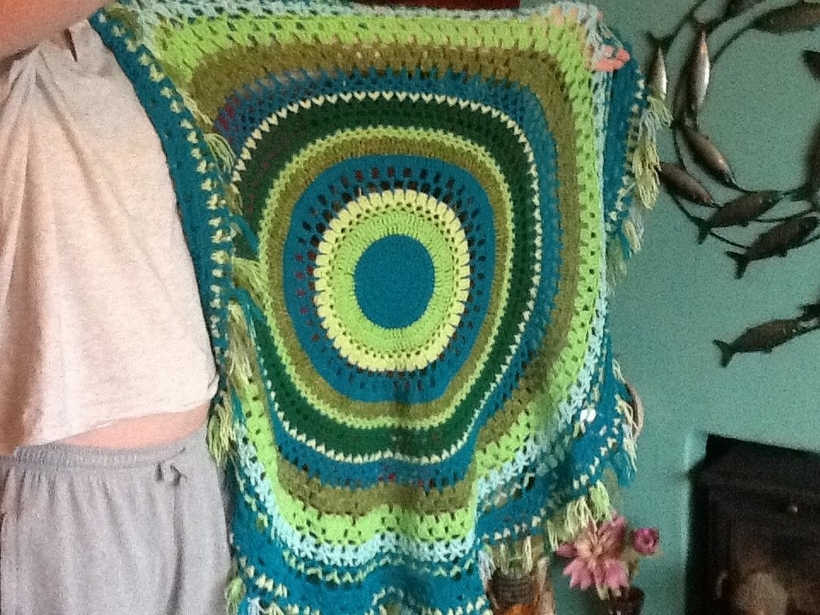 green-and-turquoise-fringed-picnic-blanket